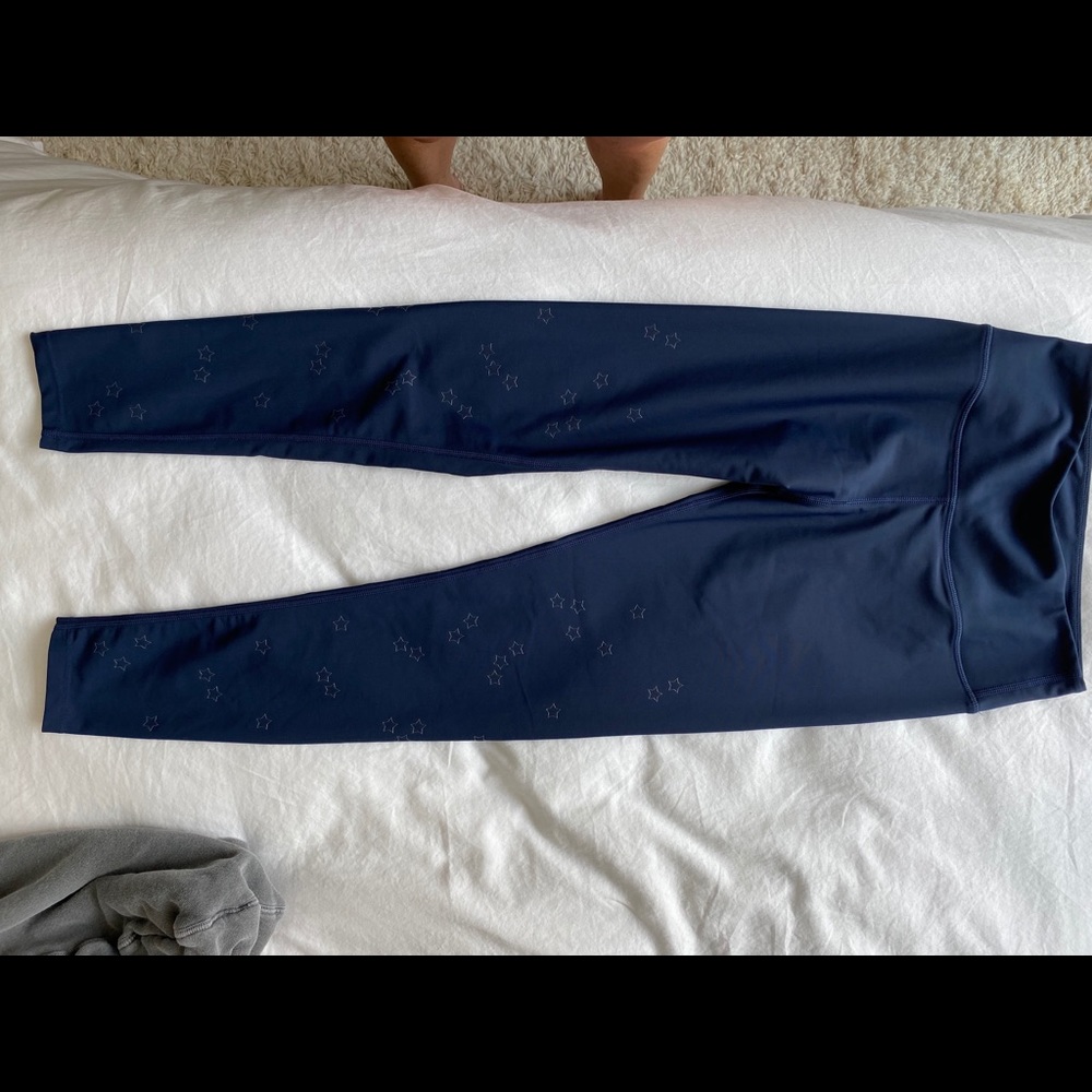 Navy Soulcycle leggings with grey stars.  Size S